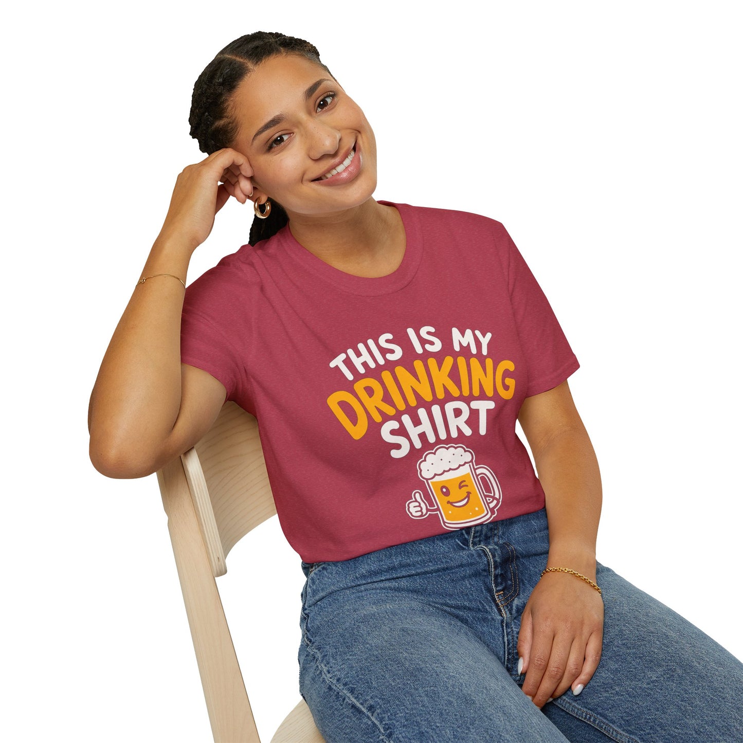 This Is My Drinking Shirt, Heather Cardinal red, worn by a model seated on a wooden chair