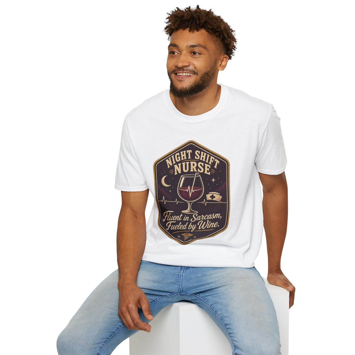 Fluent in Sarcasm Shirt, Sport Grey, worn by a model seated on a white block