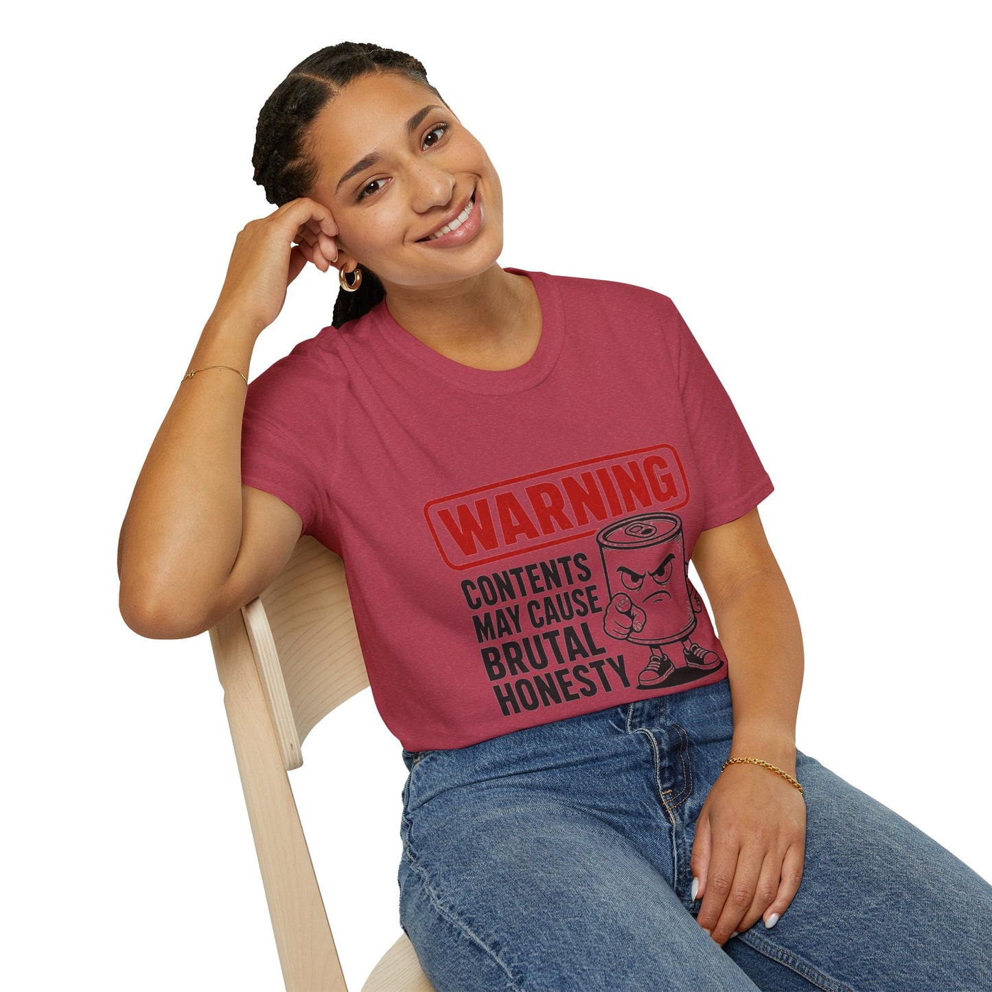 Warning: Contents May Cause Brutal Honesty Shirt, Heather Cardinal red, worn by a model seated on a wooden chair