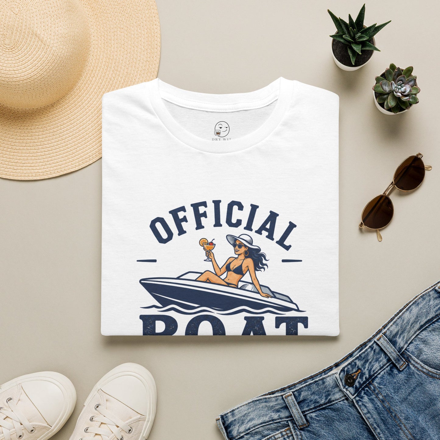 Official Boat Cocktail Drink Tester Shirt, White, folded flat lay styled with a straw hat, sunglasses, sneakers and denim