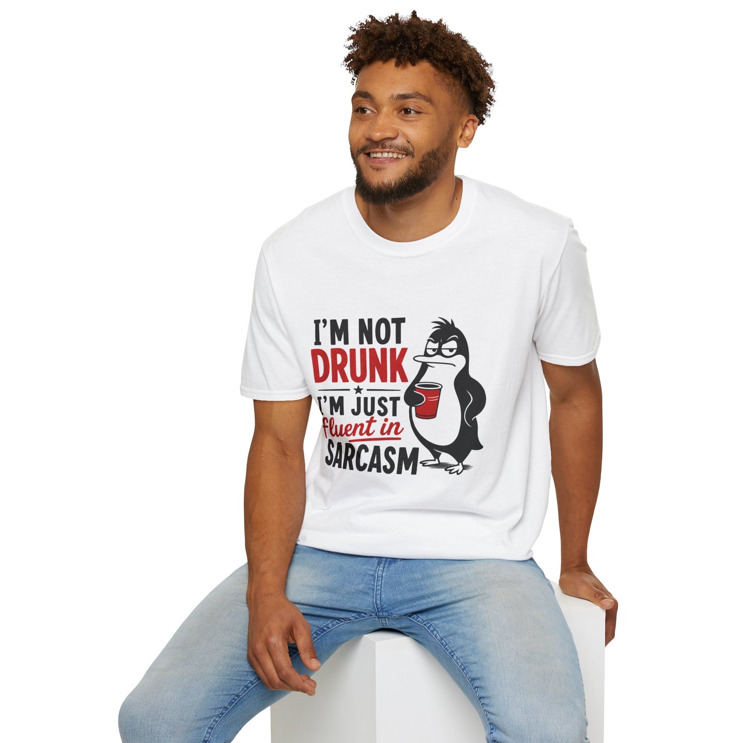 I'm Not Drunk, I'm Just Fluent in Sarcasm Shirt, White, worn by a model seated on a white block