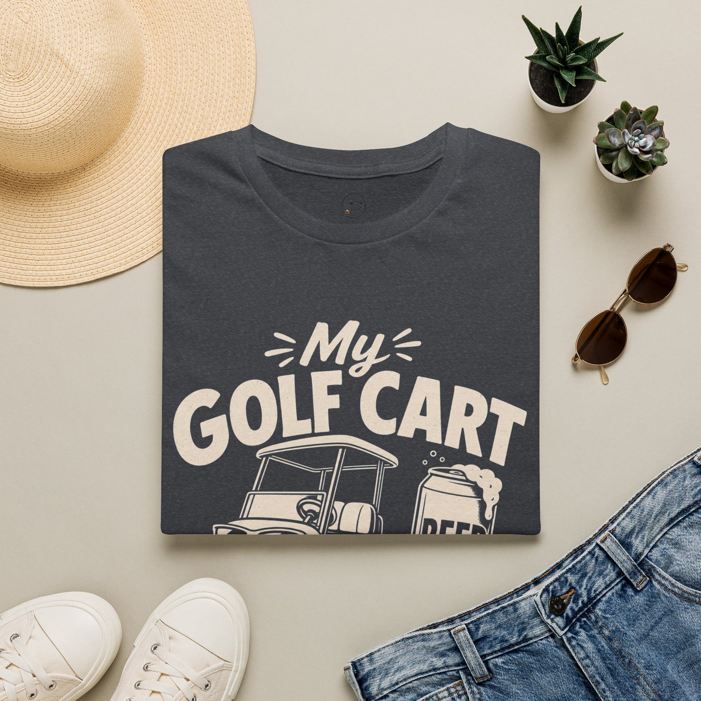 My Golf Cart Runs on Beer Shirt, Dark Heather Grey, folded flat lay styled with a straw hat, sunglasses, sneakers and denim