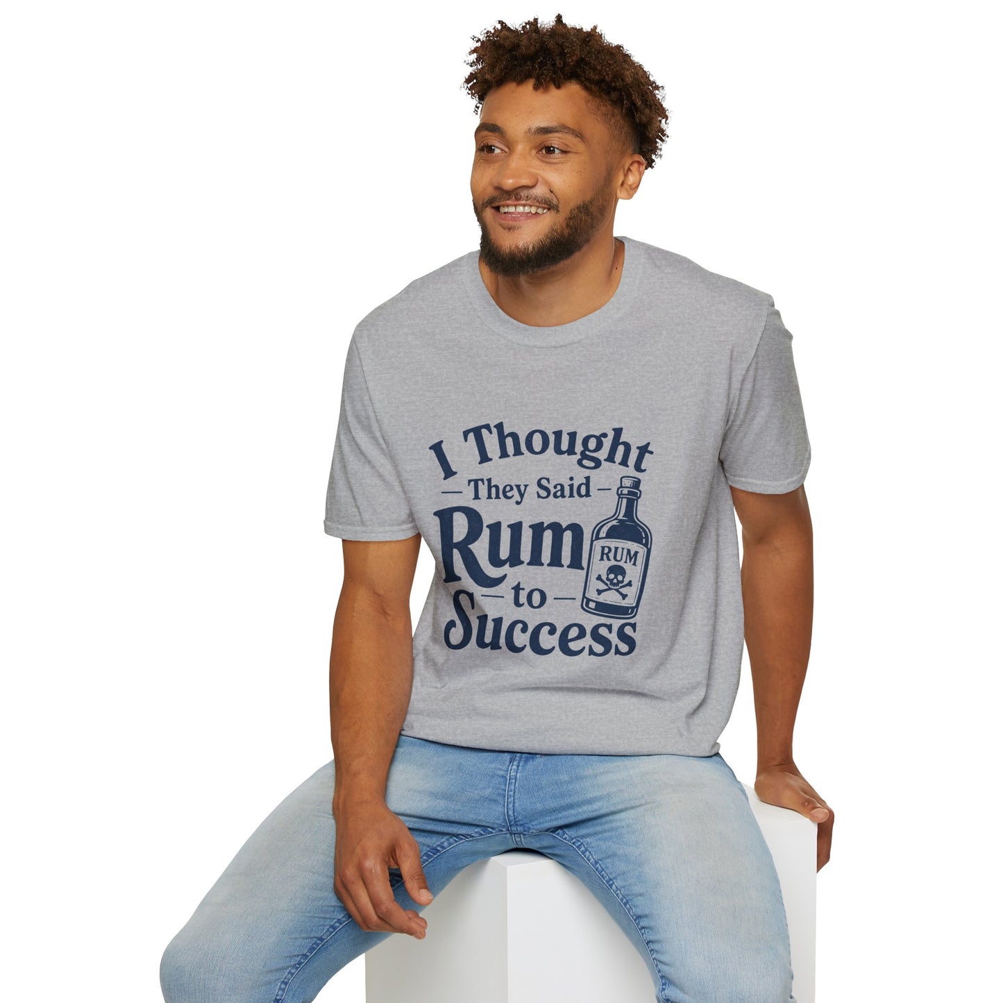 I Thought They Said Rum to Success Shirt, Sport Grey, worn by a model seated on a white block