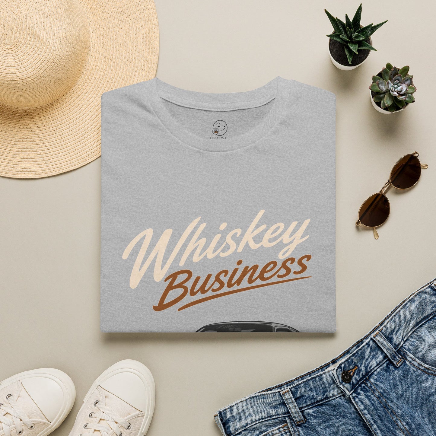 Whiskey Business Shirt, Sport Grey, folded flat lay styled with a straw hat, sunglasses, sneakers and denim