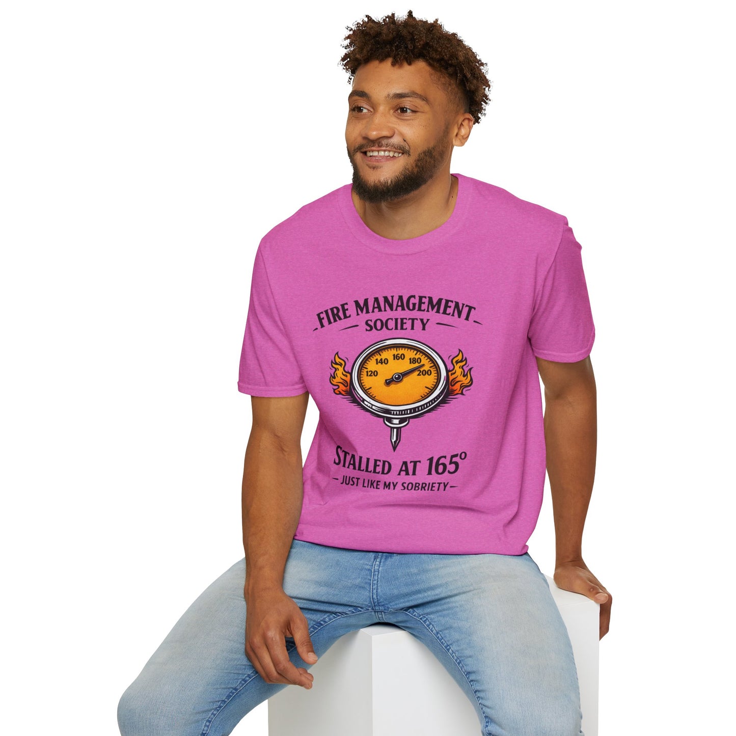 Fire Management Society Shirt, Heather Berry pink, worn by a model seated on a white block