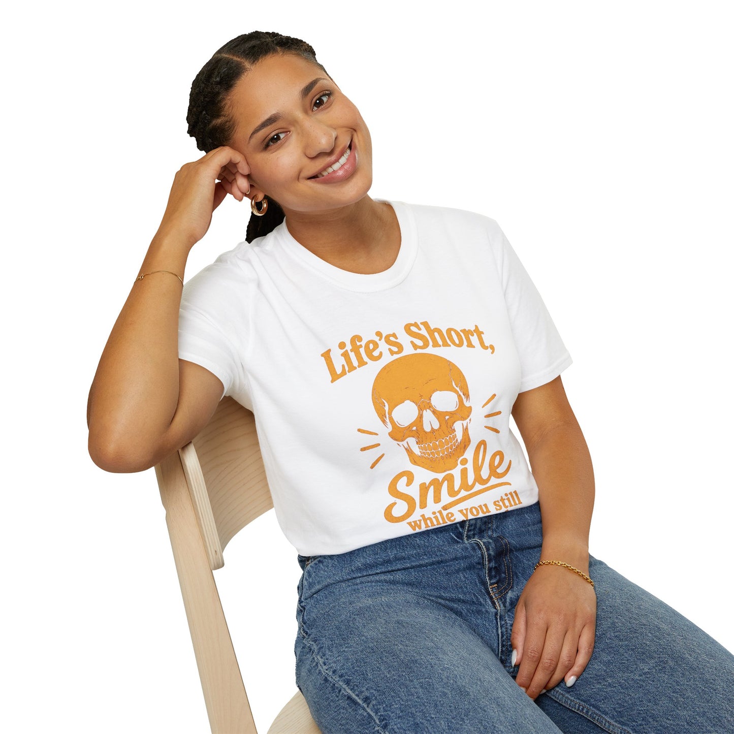 Life's Short, Smile While You Have Teeth Shirt, White, worn by a model seated on a wooden chair