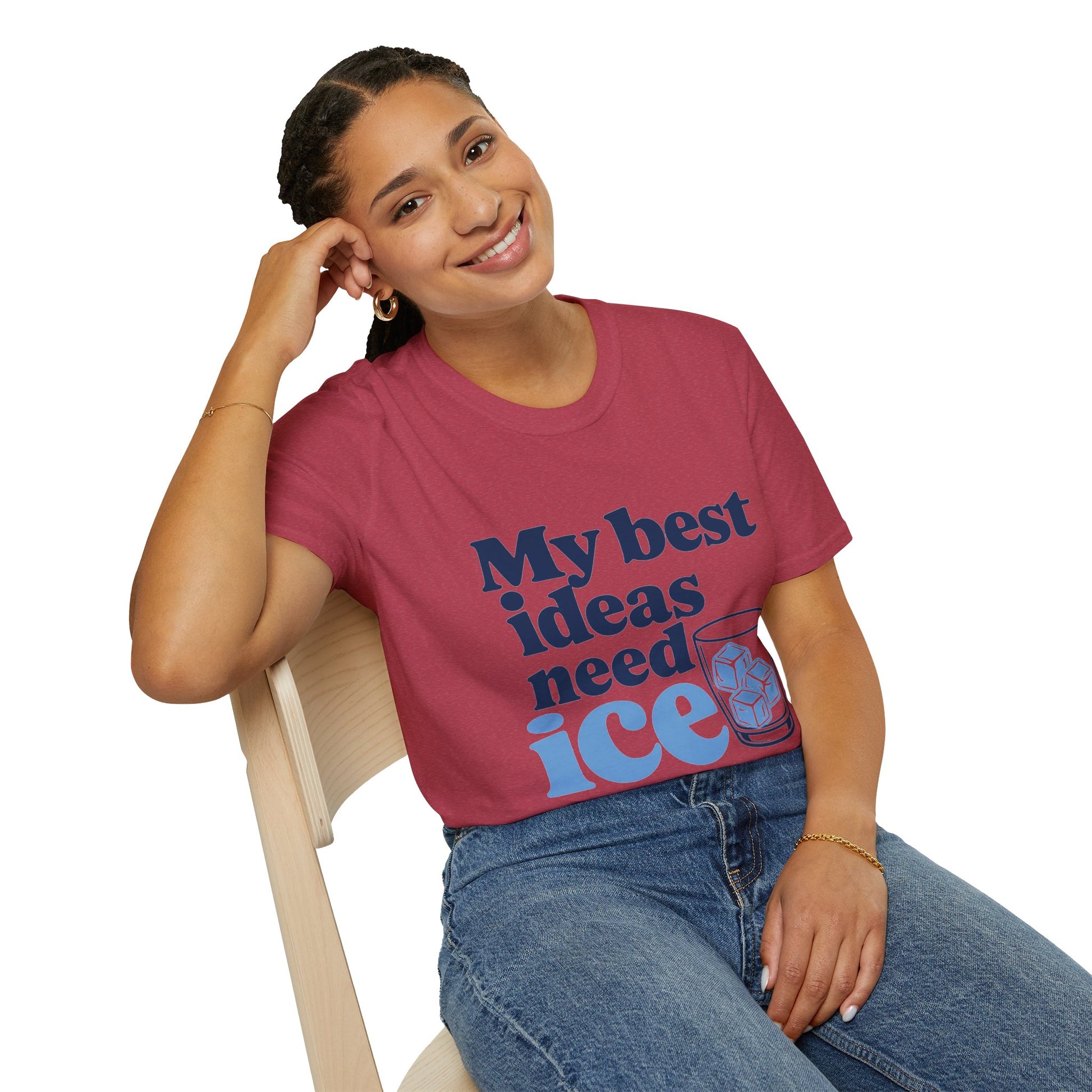 My Best Ideas Need Ice Shirt, Heather Cardinal red, worn by a model seated on a wooden chair