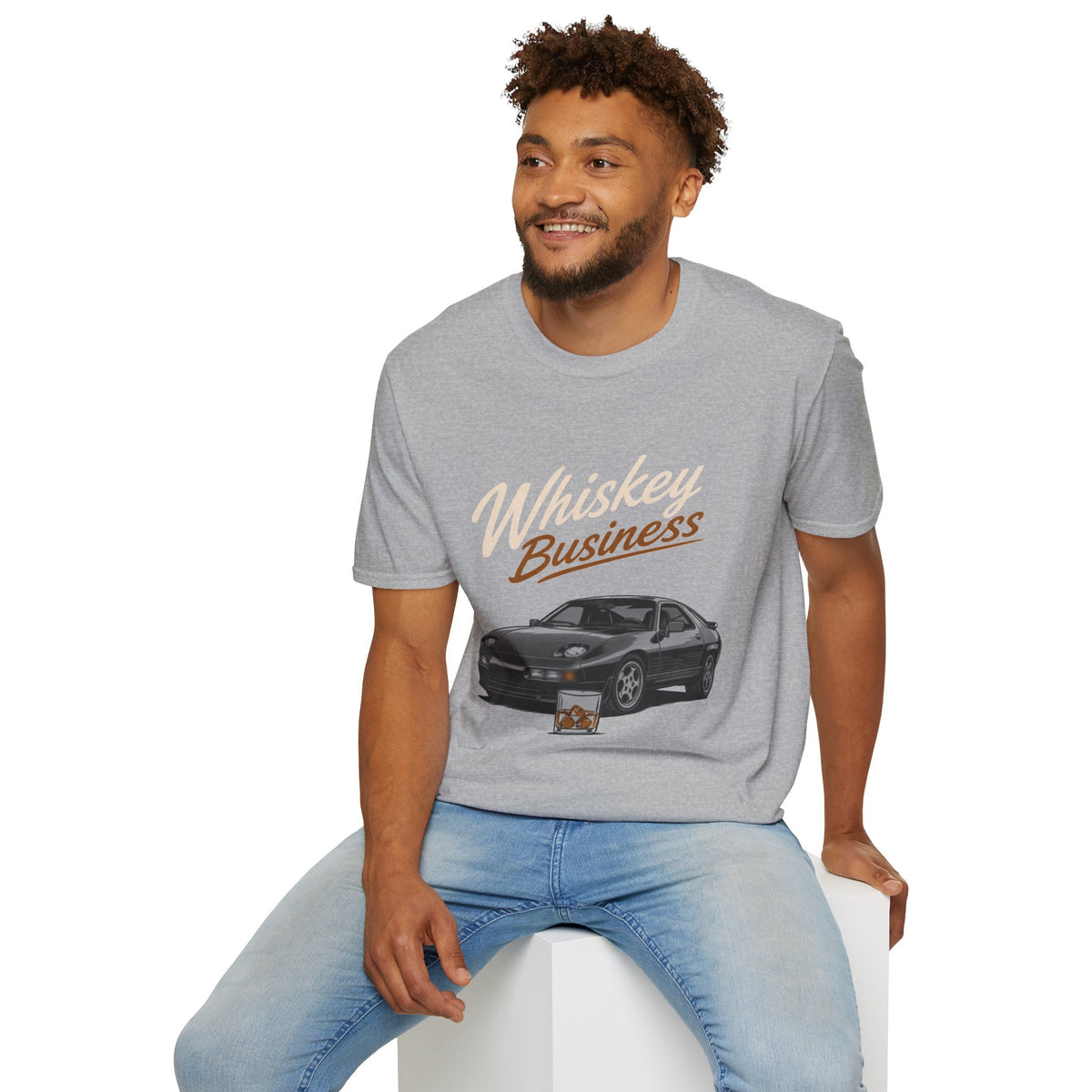 Whiskey Business Shirt, Sport Grey, worn by a model seated on a white block