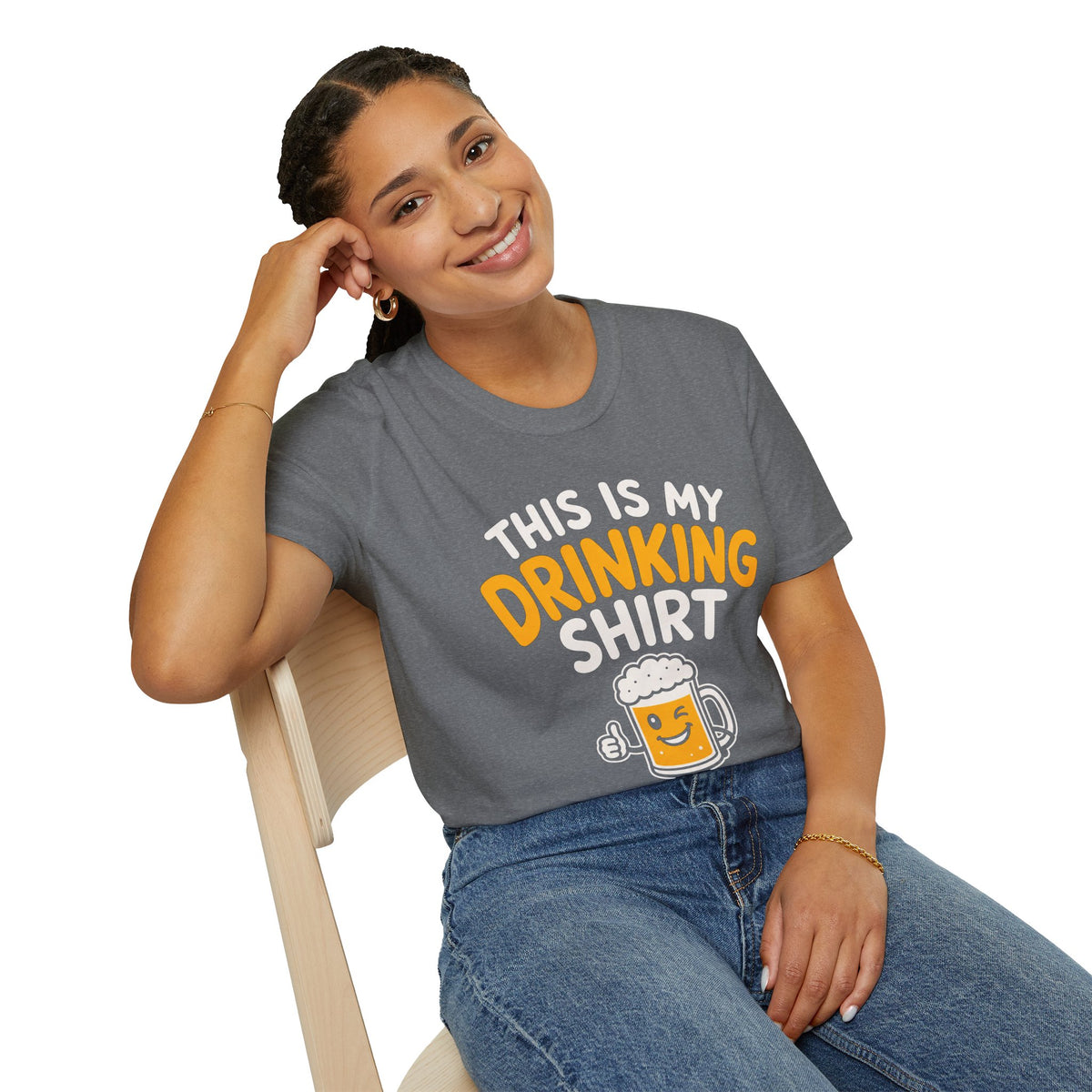 This Is My Drinking Shirt, Graphite Heather grey, worn by a model seated on a wooden chair