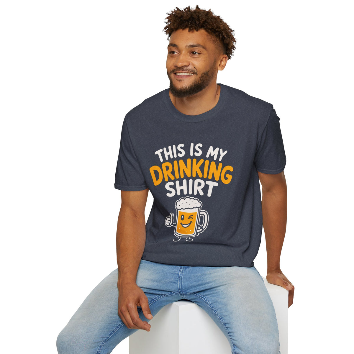 This Is My Drinking Shirt, Heather Navy, worn by a model seated on a white block
