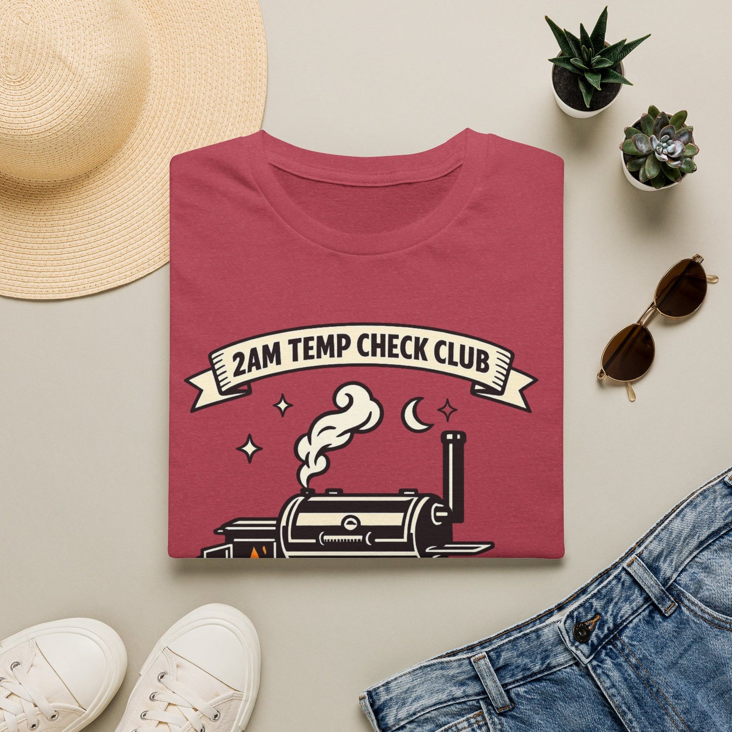 2AM Temp Check Club Shirt, Heather Cardinal red, folded flat lay styled with a straw hat, sunglasses, sneakers and denim