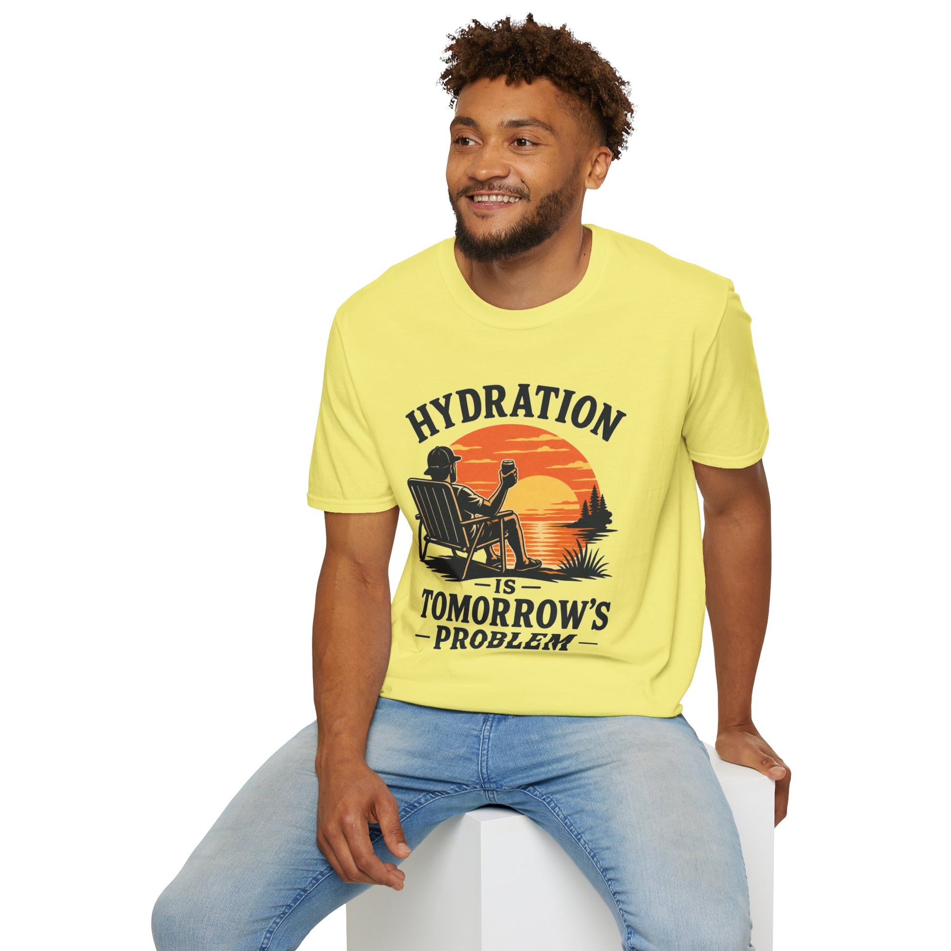 Hydration Is Tomorrow's Problem Shirt, Cornsilk pale yellow, worn by a model seated on a white block