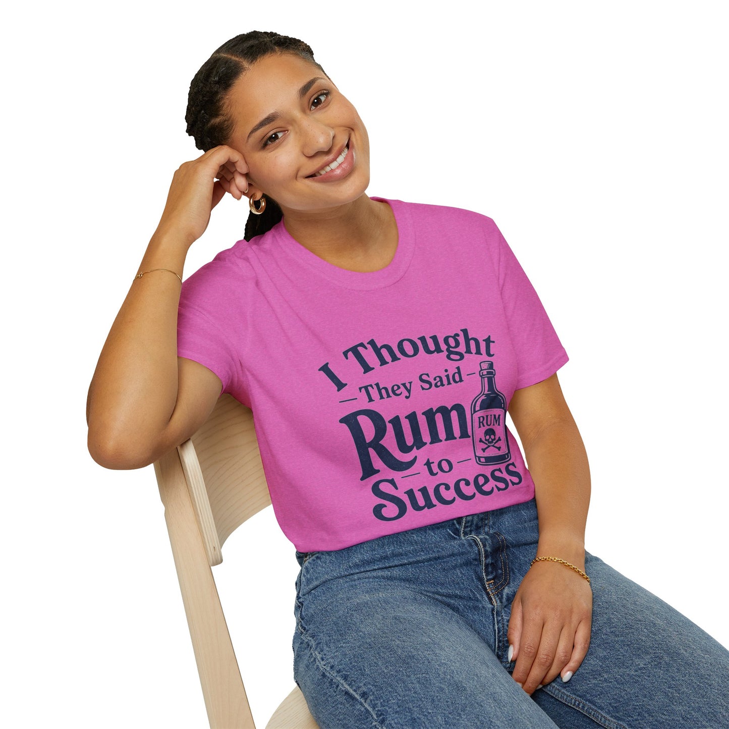 I Thought They Said Rum to Success Shirt, Heather Berry pink, worn by a model seated on a wooden chair