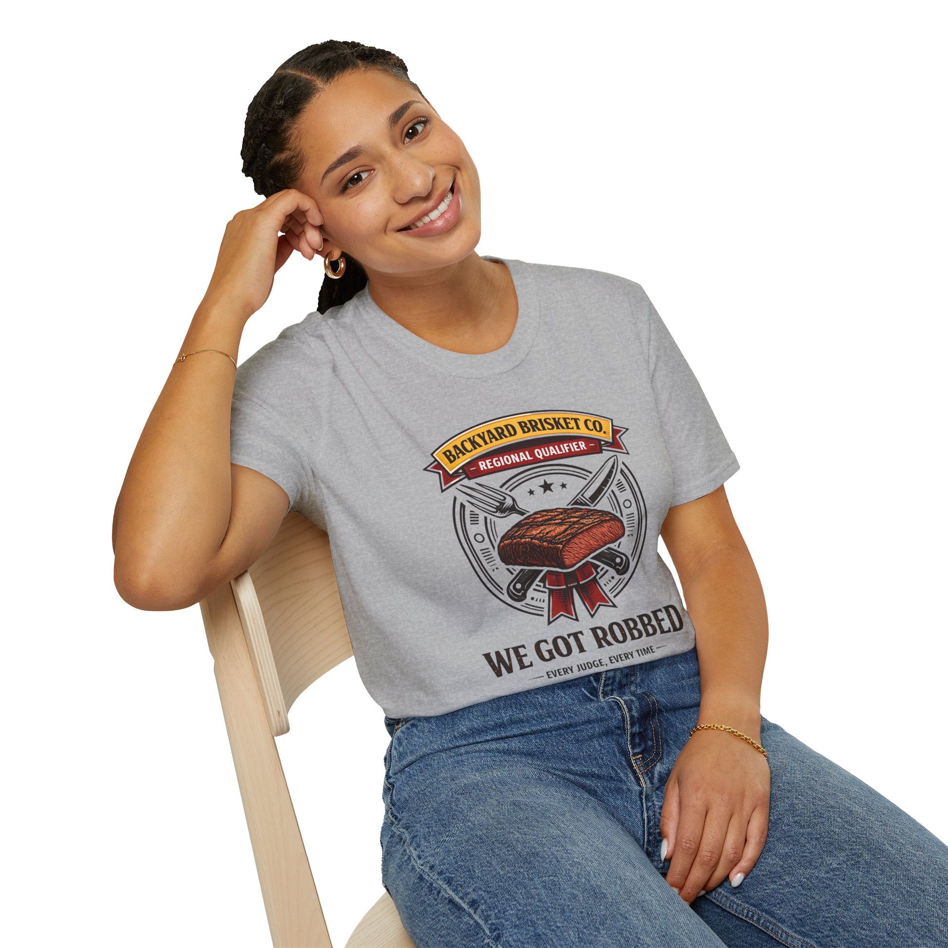 Backyard Brisket Co. Shirt, Sport Grey, worn by a model seated on a wooden chair