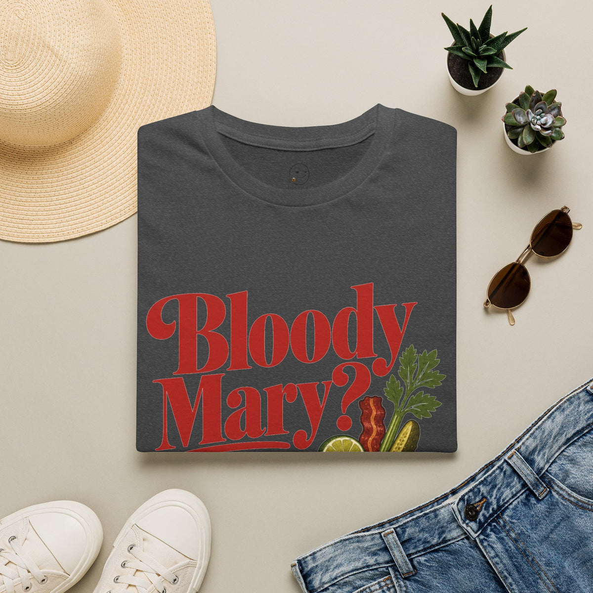 Bloody Mary Shirt, Dark Heather charcoal, folded flat lay styled with a straw hat, sunglasses, sneakers and denim