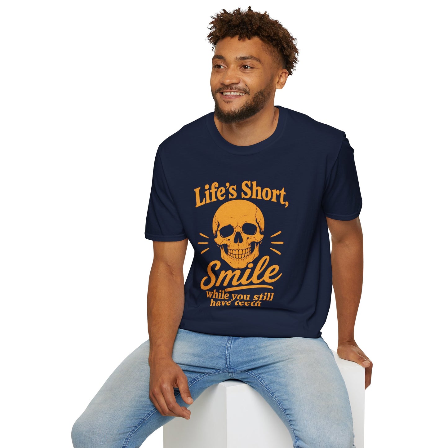 Life's Short, Smile While You Have Teeth Shirt, Navy, worn by a model seated on a white block