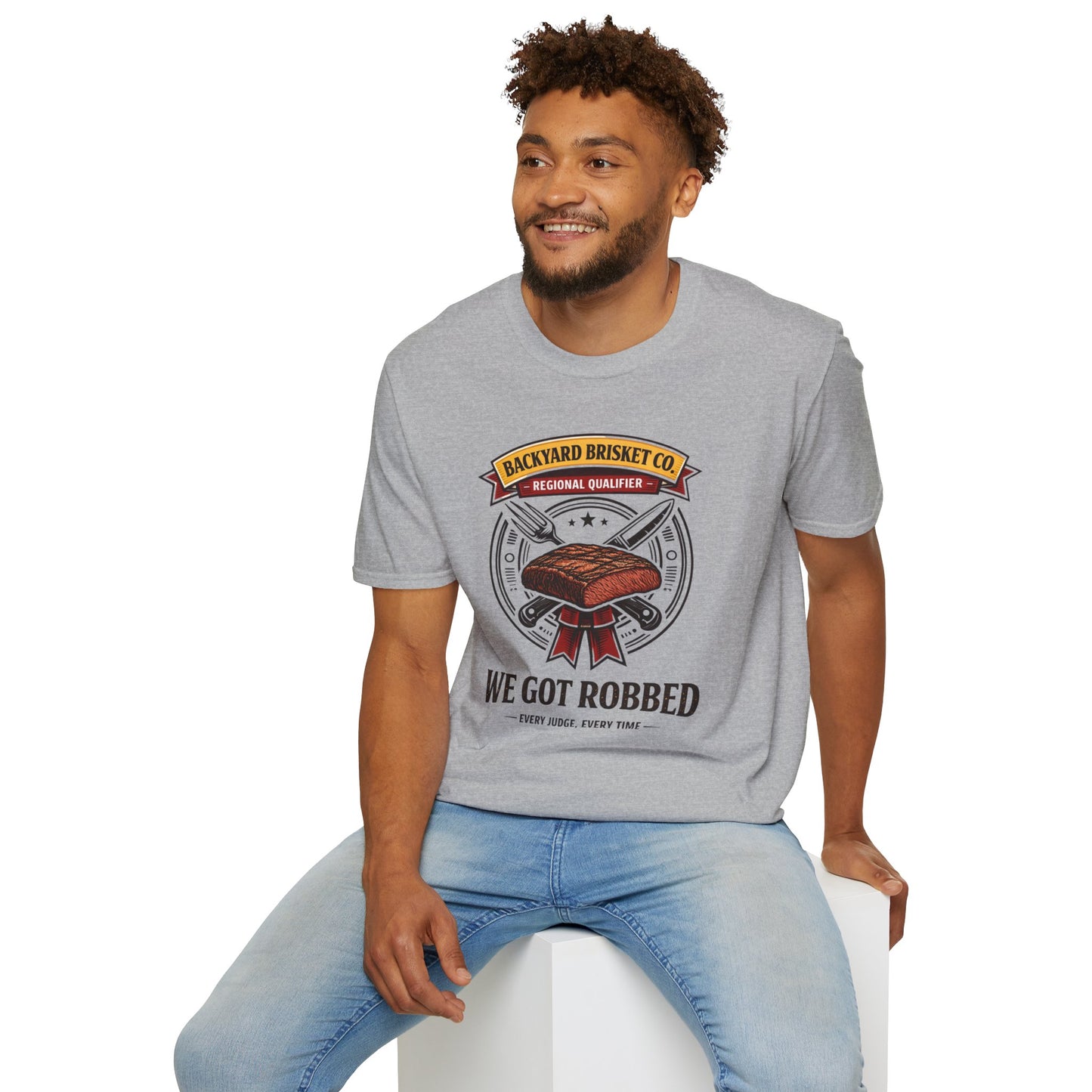 Backyard Brisket Co. Shirt, Sport Grey, worn by a model seated on a white block