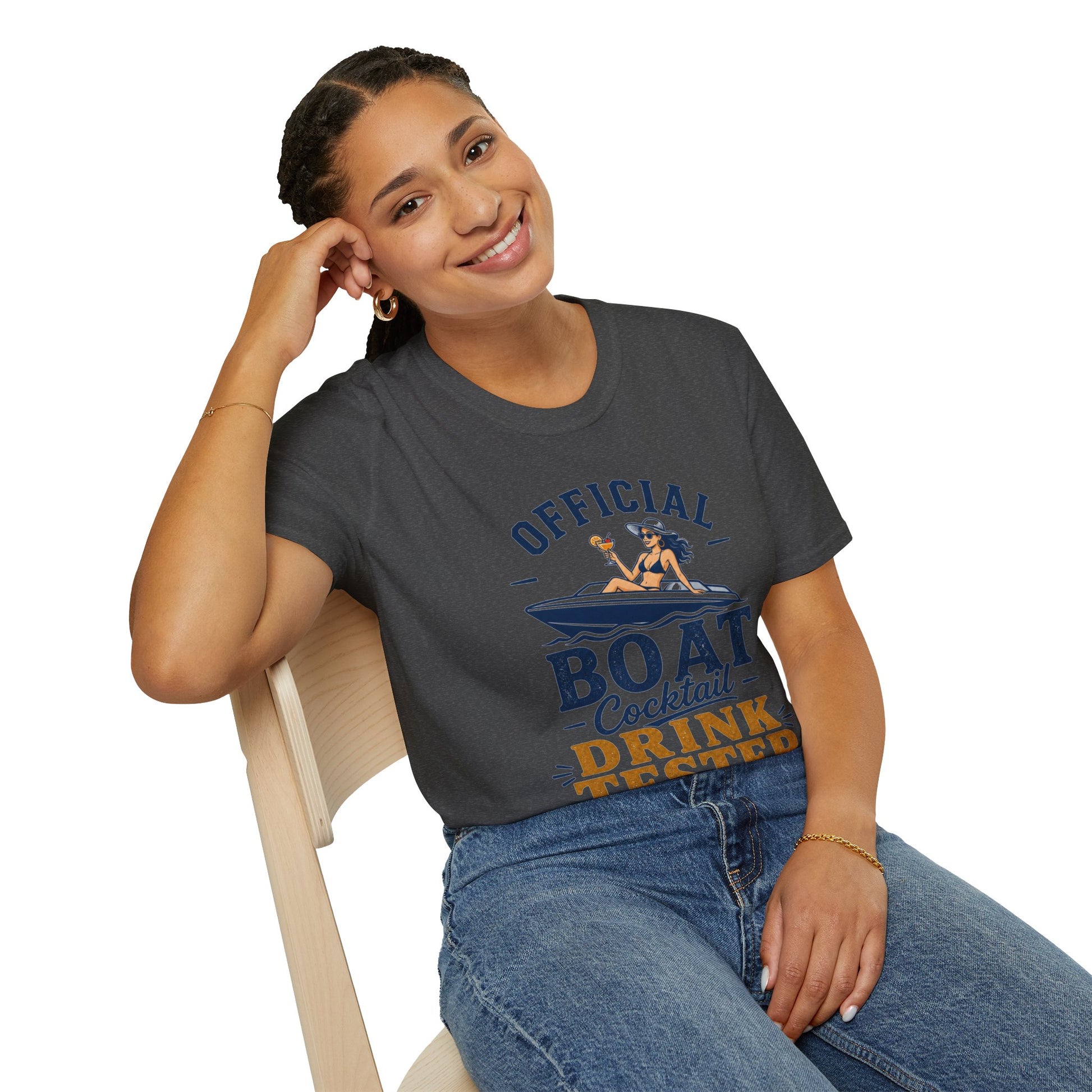 Official Boat Cocktail Drink Tester Shirt, Dark Heather charcoal, worn by a model seated on a wooden chair