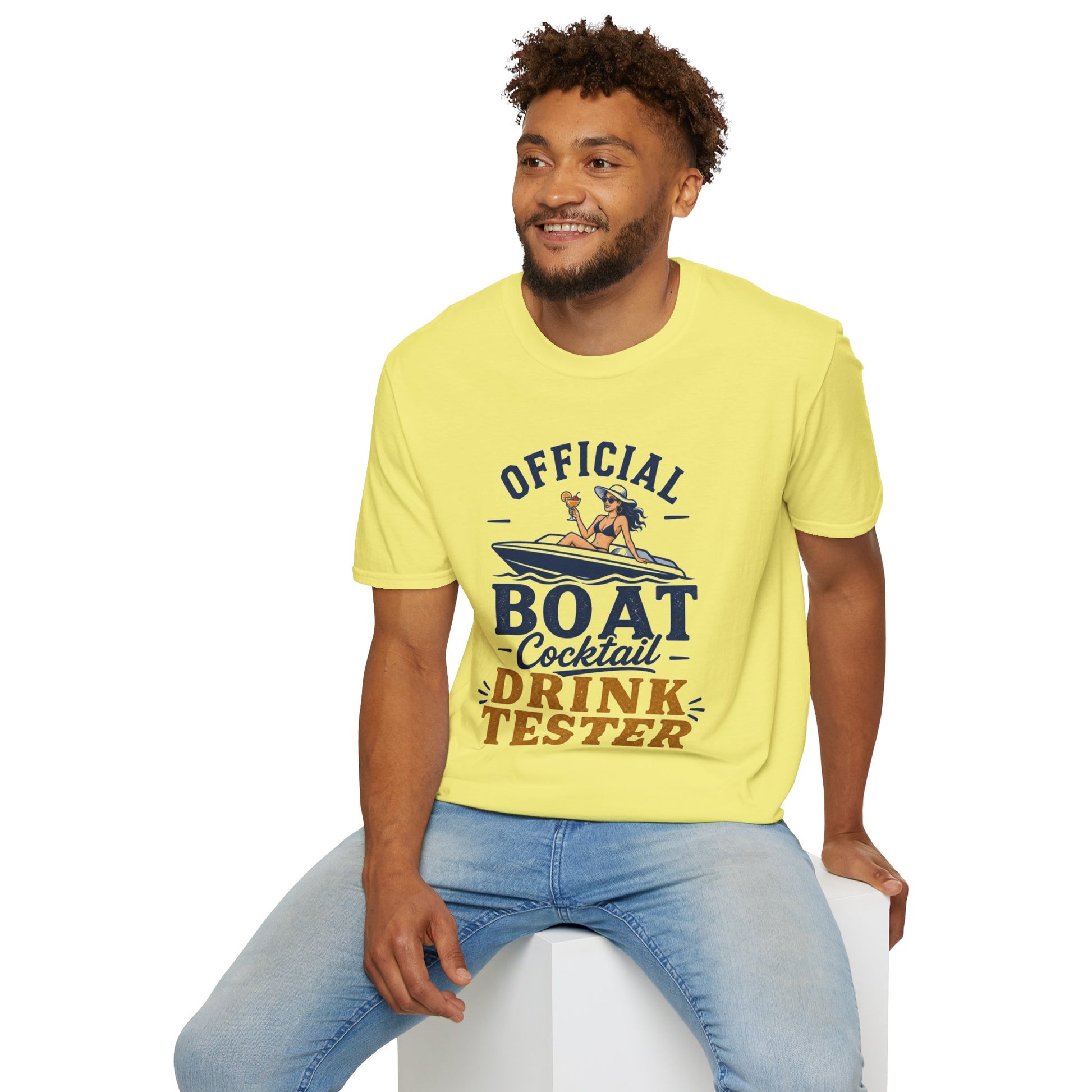 Official Boat Cocktail Drink Tester Shirt, Cornsilk pale yellow, worn by a model seated on a white block