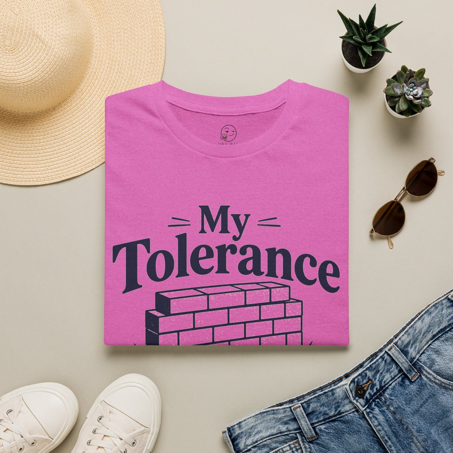 My Tolerance Is the Only Thing I've Built, Heather Berry pink, folded flat lay styled with a straw hat, sunglasses, sneakers and denim