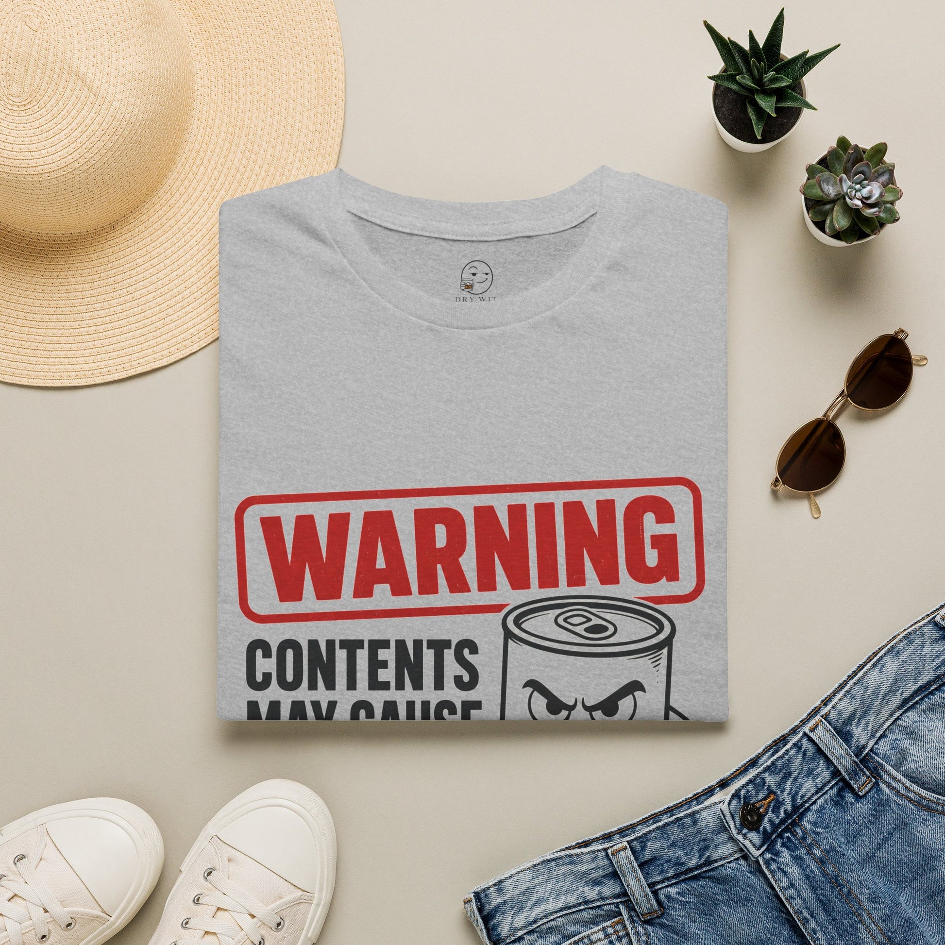 Warning: Contents May Cause Brutal Honesty Shirt, Sport Grey, folded flat lay styled with a straw hat, sunglasses, sneakers and denim