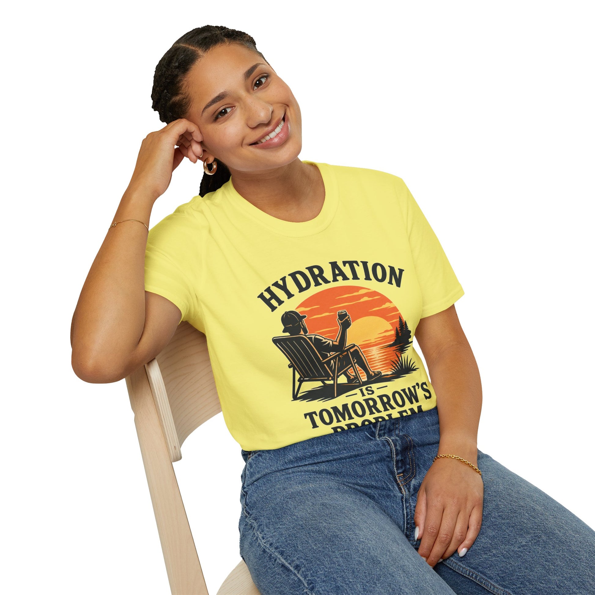 Hydration Is Tomorrow's Problem Shirt, Cornsilk pale yellow, worn by a model seated on a wooden chair