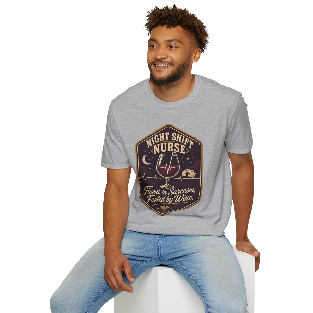 Fluent in Sarcasm Shirt, Sport Grey, worn by a model seated on a white block