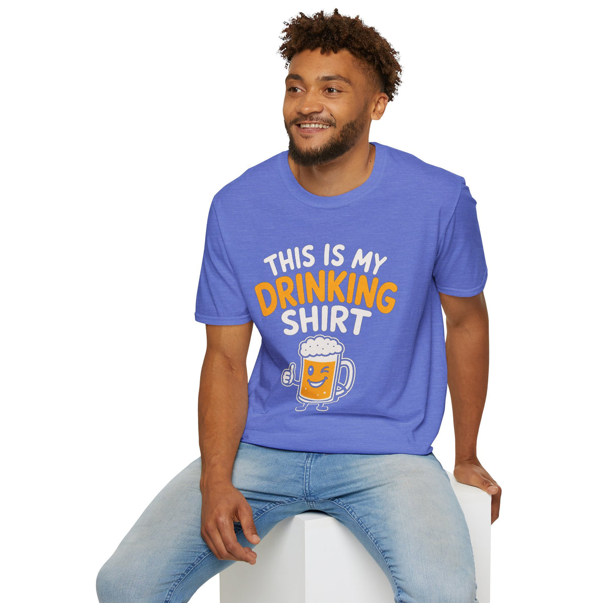 This Is My Drinking Shirt, Heather Royal blue, worn by a model seated on a white block