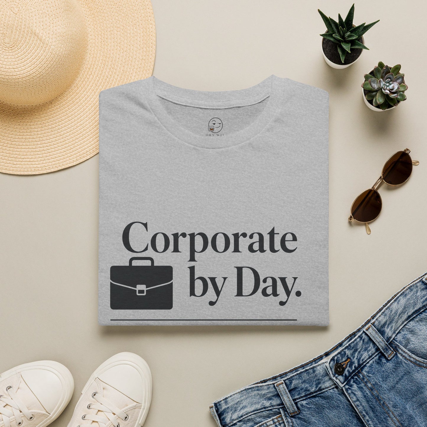 Corporate by Day, Cocktails by Night Shirt, Sport Grey, folded flat lay styled with a straw hat, sunglasses, sneakers and denim