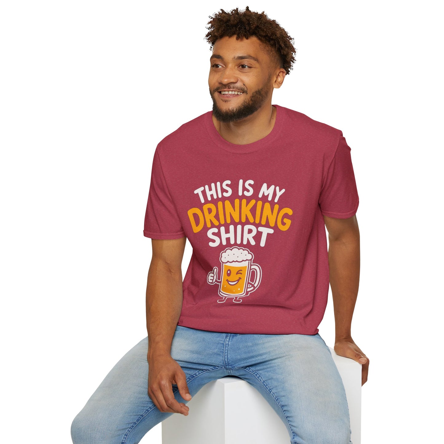 This Is My Drinking Shirt, Heather Cardinal red, worn by a model seated on a white block
