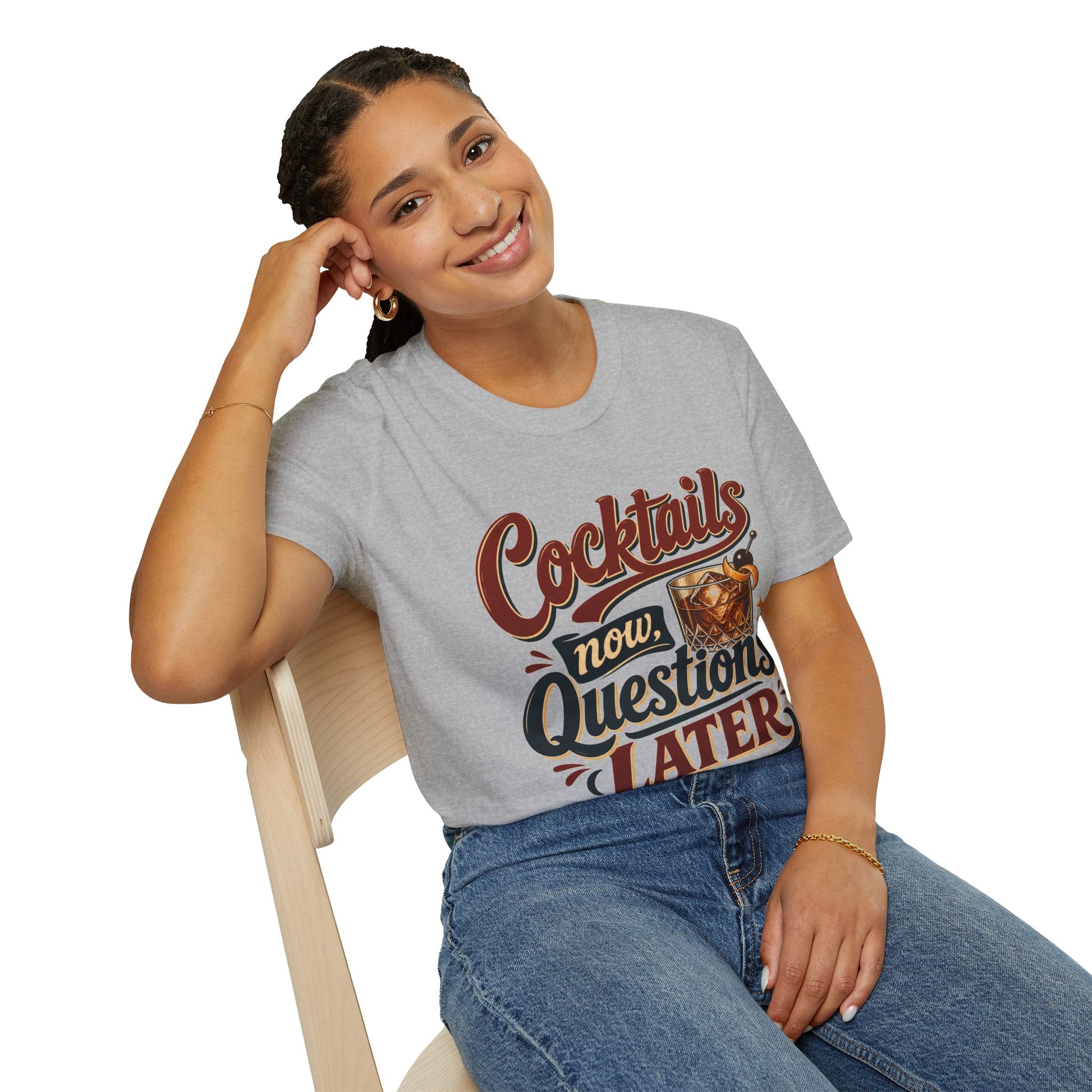 Cocktails Now, Questions Later Shirt, Sport Grey, worn by a model seated on a wooden chair