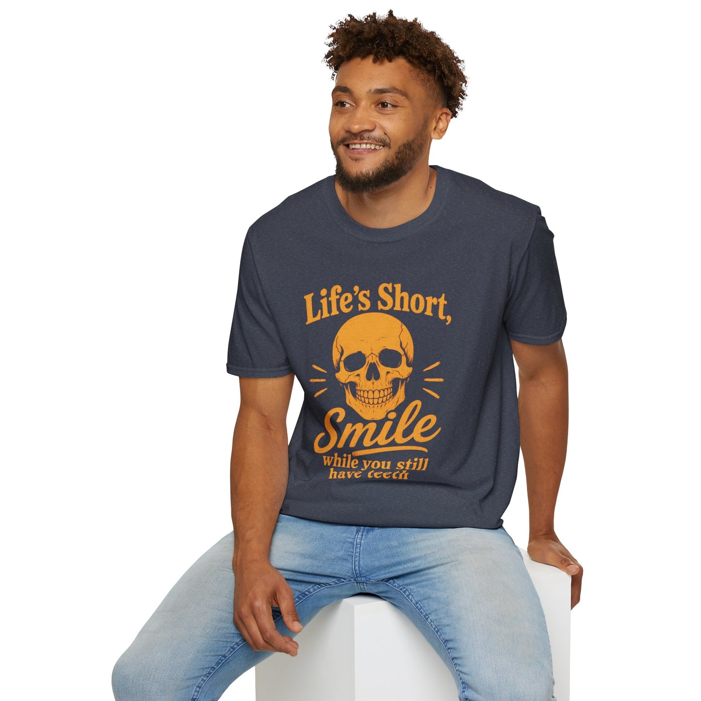 Life's Short, Smile While You Have Teeth Shirt, Heather Navy, worn by a model seated on a white block