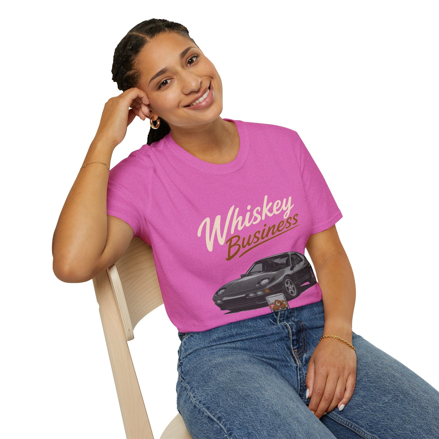 Whiskey Business Shirt, Heather Berry pink, worn by a model seated on a wooden chair