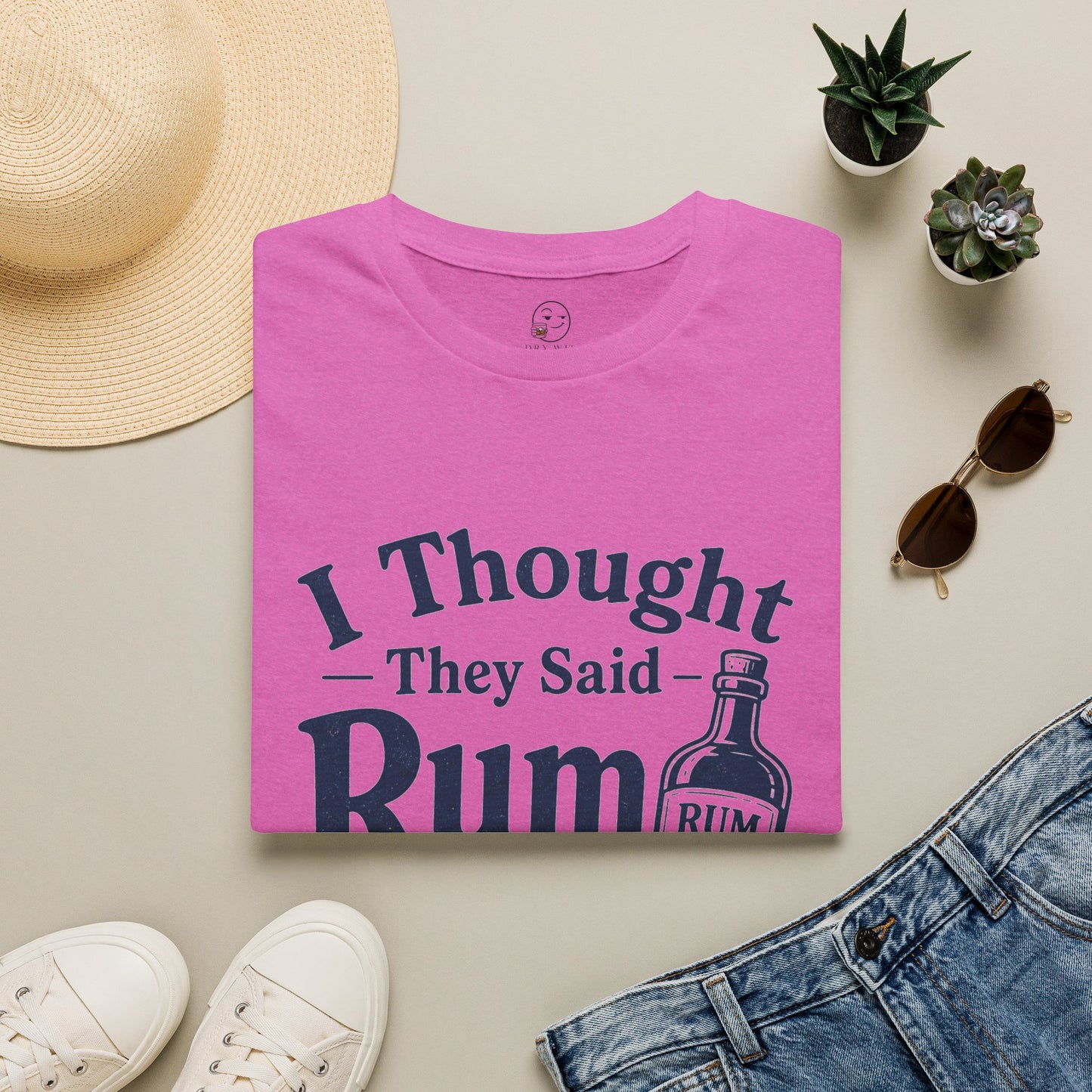 I Thought They Said Rum to Success Shirt, Heather Berry pink, folded flat lay styled with a straw hat, sunglasses, sneakers and denim