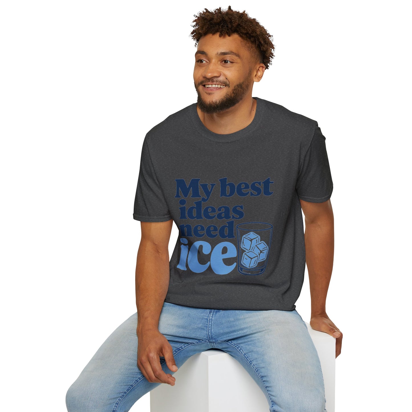 My Best Ideas Need Ice Shirt, Dark Heather charcoal, worn by a model seated on a white block