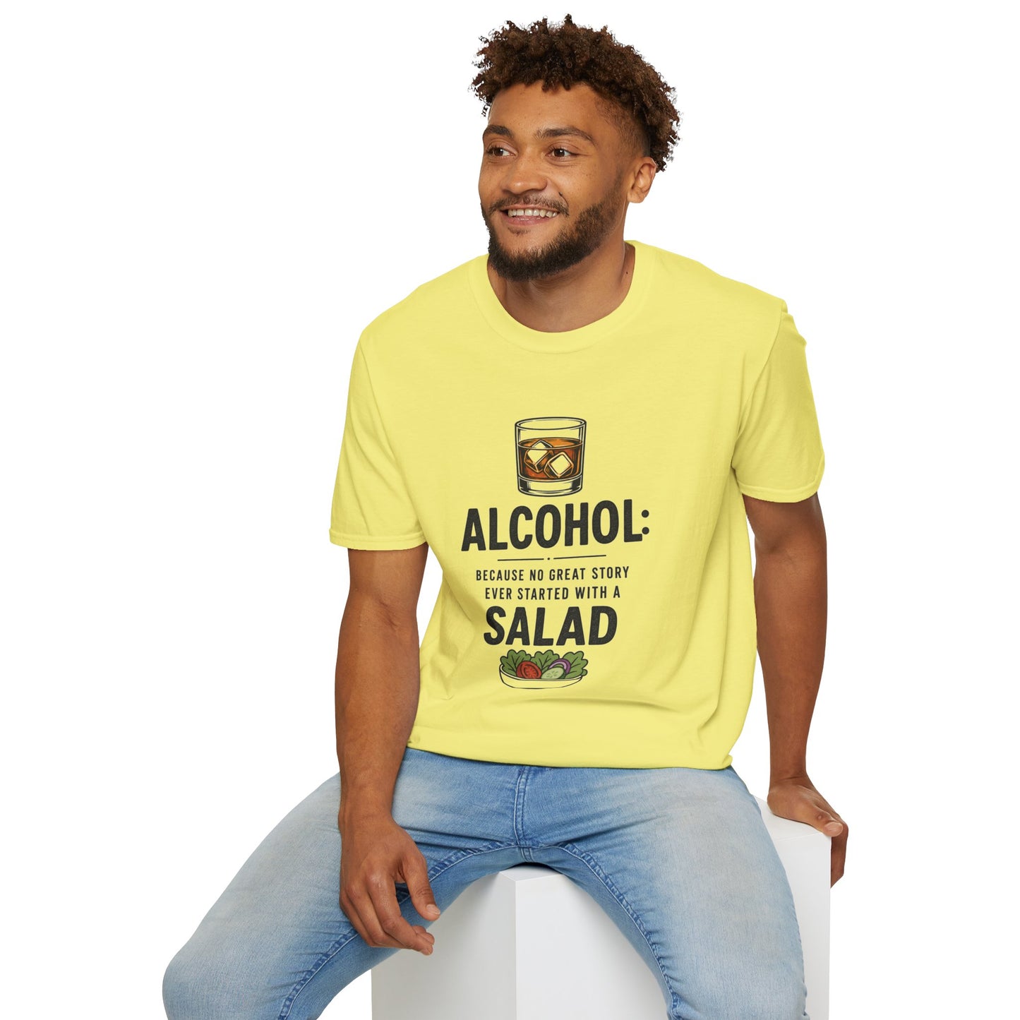 No Great Story Started With a Salad Shirt, Cornsilk pale yellow, worn by a model seated on a white block