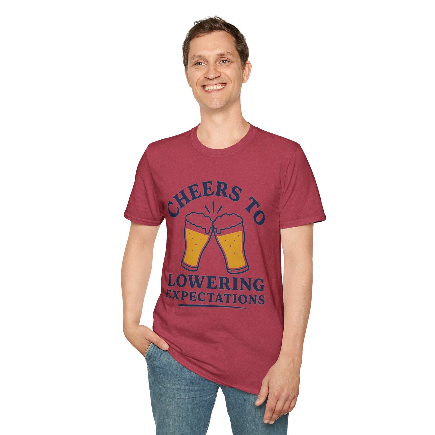 Cheers to Lowering Expectations Shirt, Heather Cardinal red, worn by a standing model with one hand in their pocket