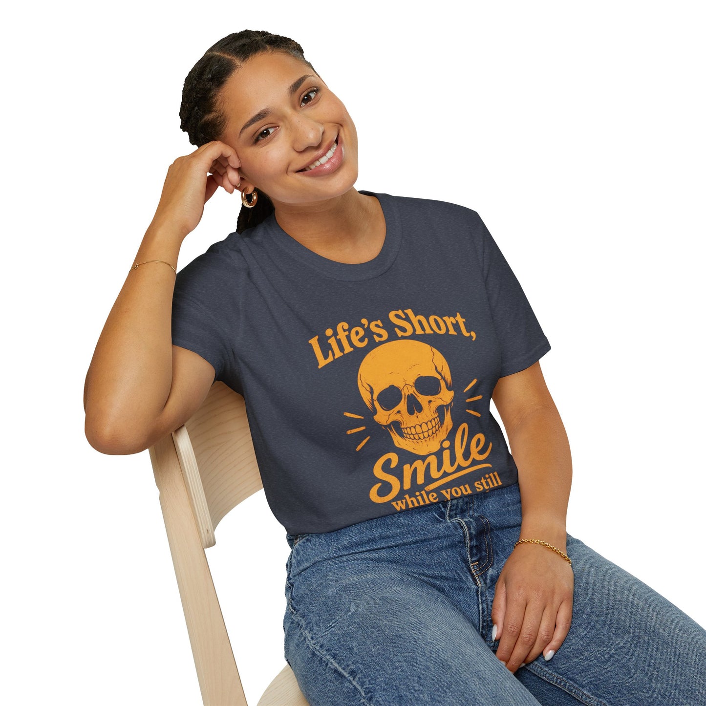Life's Short, Smile While You Have Teeth Shirt, Heather Navy, worn by a model seated on a wooden chair