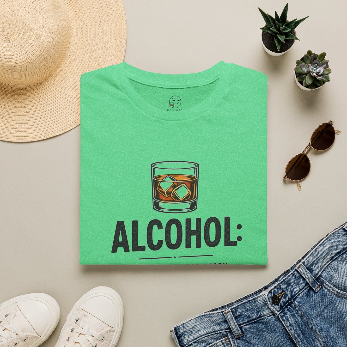 No Great Story Started With a Salad Shirt, Heather Irish Green mint, folded flat lay styled with a straw hat, sunglasses, sneakers and denim