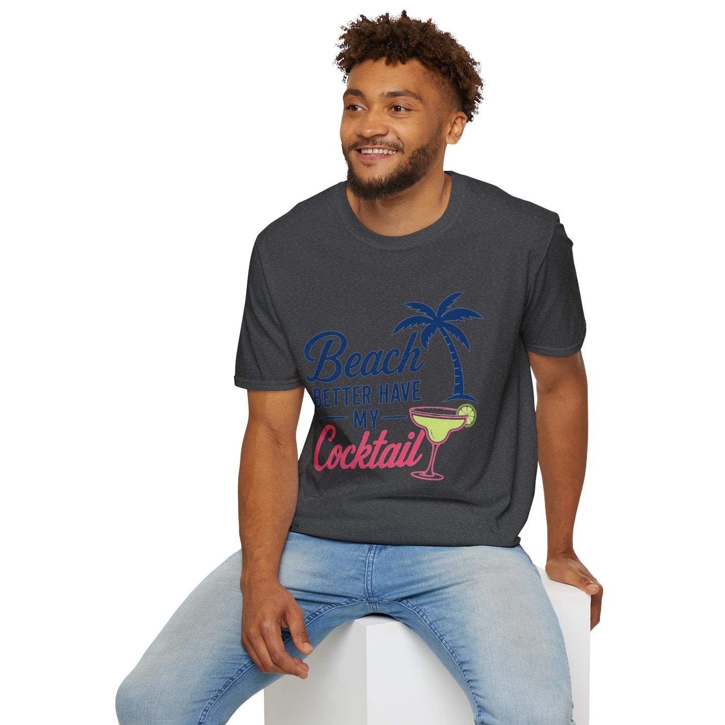 Beach Better Have My Cocktail Shirt, Dark Heather charcoal, worn by a model seated on a white block