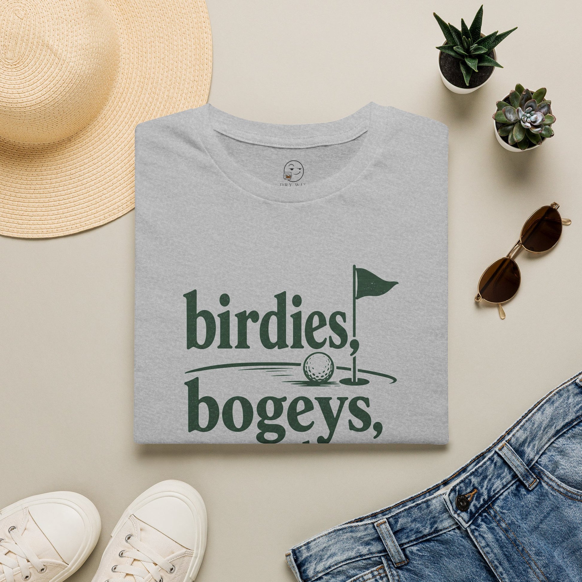 Birdies, Bogeys, and Bourbon Shirt, Sport Grey, folded flat lay styled with a straw hat, sunglasses, sneakers and denim