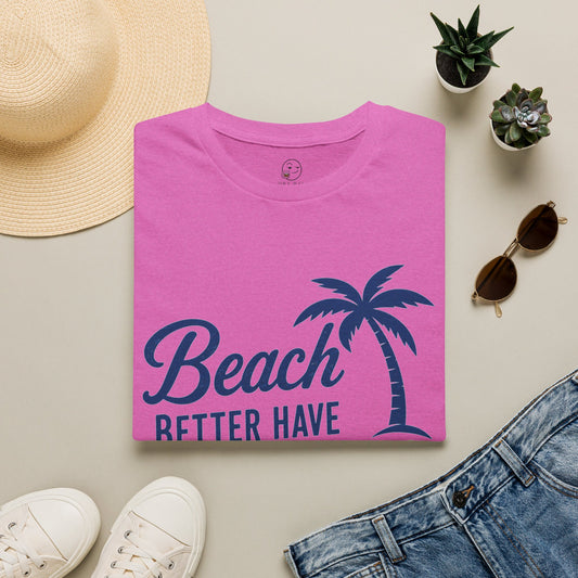Beach Better Have My Cocktail Shirt, Heather Berry pink, folded flat lay styled with a straw hat, sunglasses, sneakers and denim