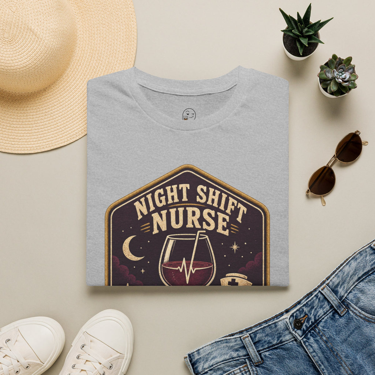 Fluent in Sarcasm Shirt, Sport Grey, folded flat lay styled with a straw hat, sunglasses, sneakers and denim