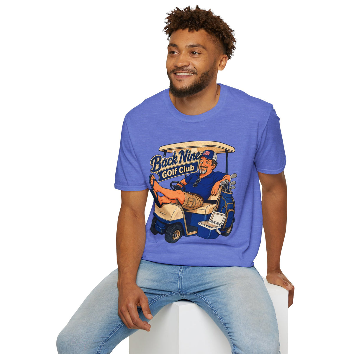 Back Nine Club Shirt, Heather Royal blue, worn by a model seated on a white block