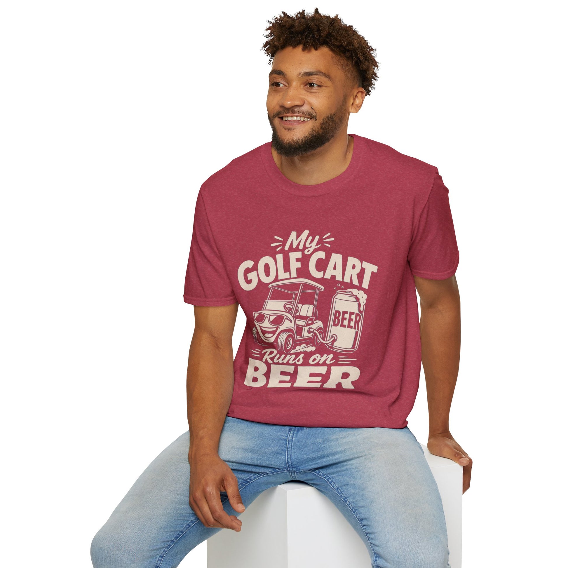 My Golf Cart Runs on Beer Shirt, Heather Cardinal red, worn by a model seated on a white block