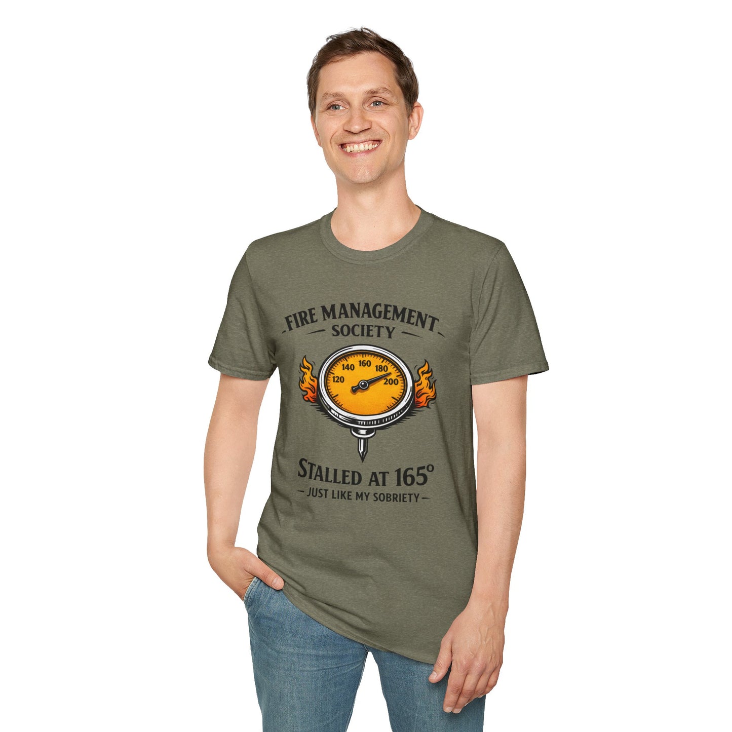 Fire Management Society Shirt, Heather Military Green olive, worn by a standing model with one hand in their pocket