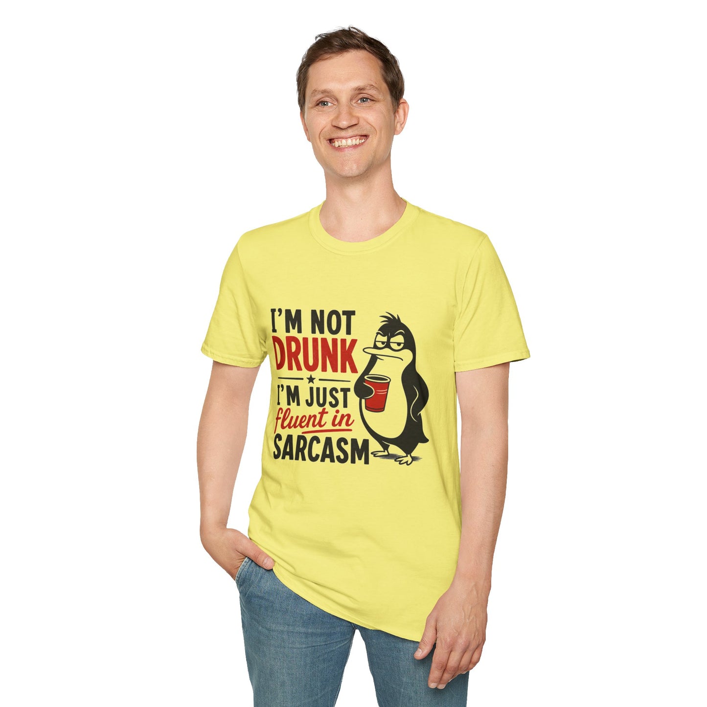 I'm Not Drunk, I'm Just Fluent in Sarcasm Shirt, Cornsilk pale yellow, worn by a standing model with one hand in their pocket