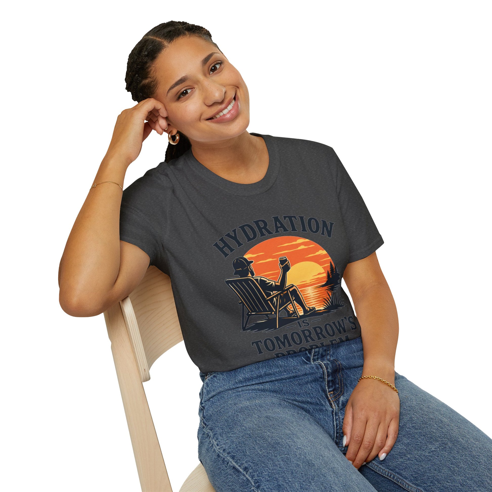 Hydration Is Tomorrow's Problem Shirt, Dark Heather charcoal, worn by a model seated on a wooden chair