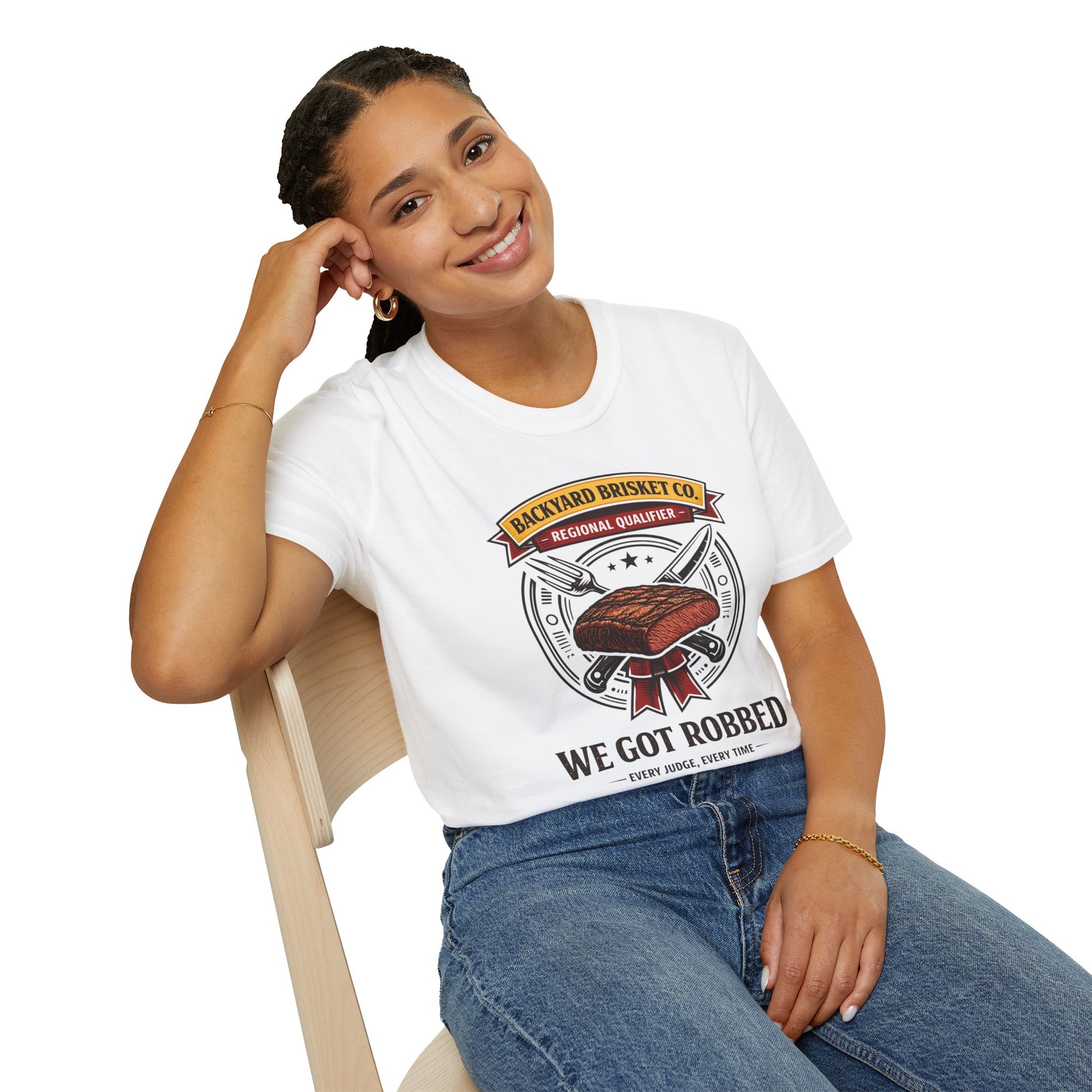 Backyard Brisket Co. Shirt, White, worn by a model seated on a wooden chair