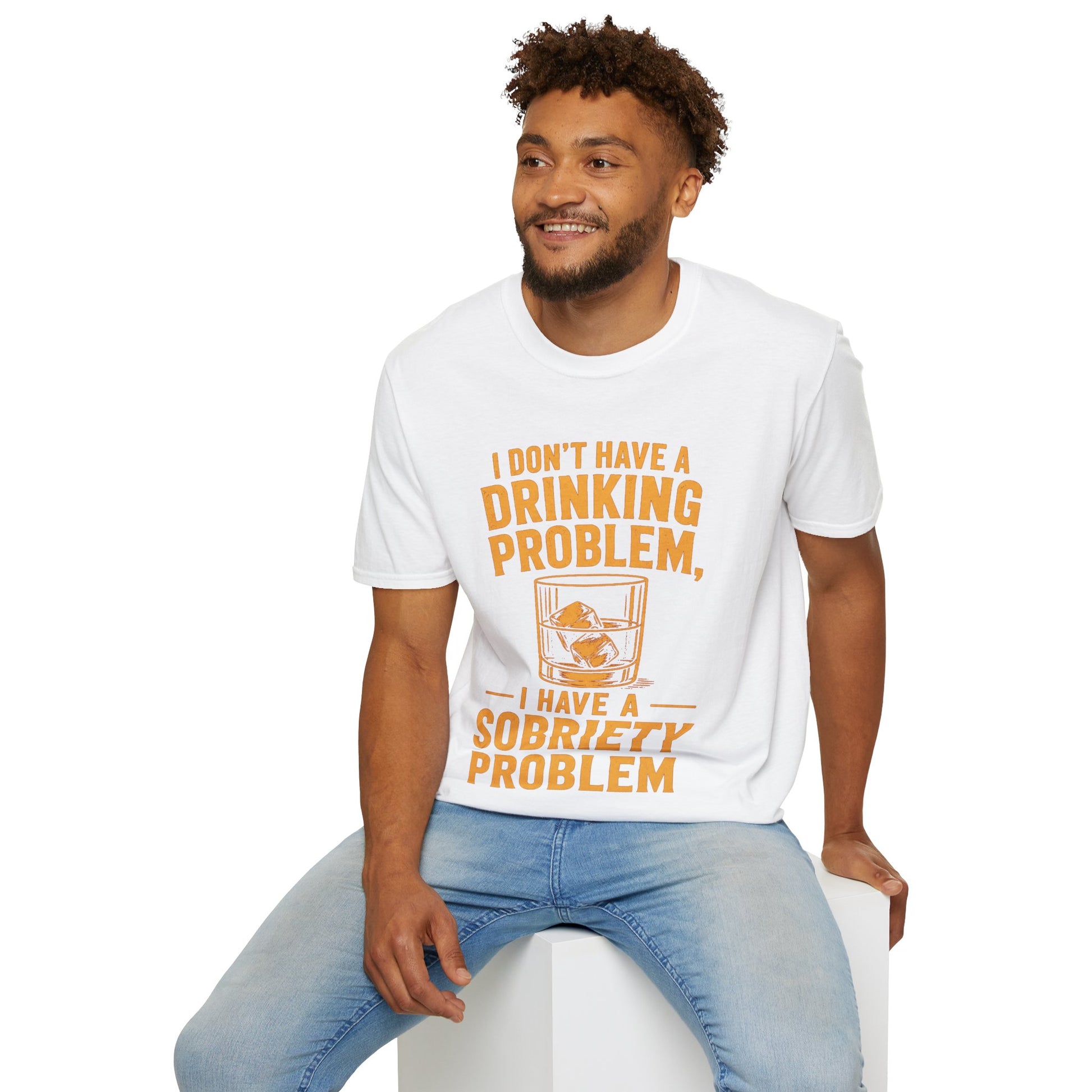 I Don't Have a Drinking Problem Shirt, White, worn by a model seated on a white block